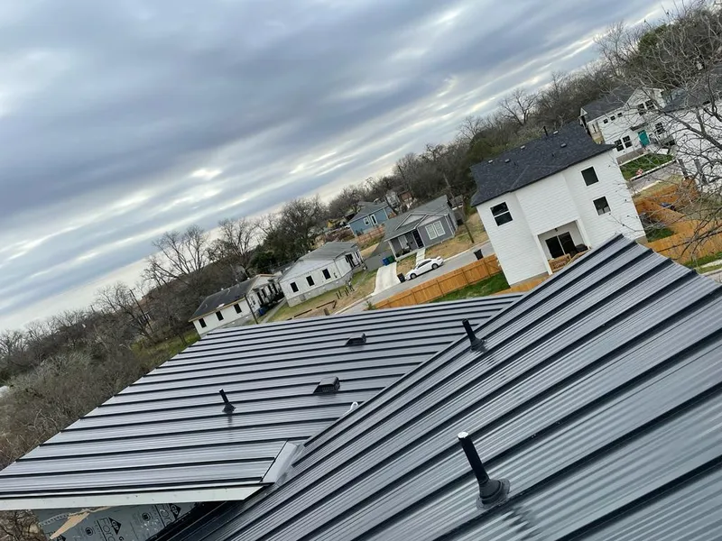 Standing seam metal roof panels with vents for Skylight Repair in Napoleon
